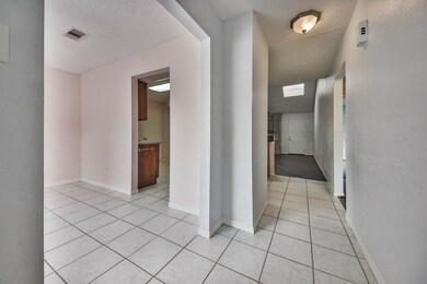 Formal Dining to Left of Entry Door.  Tile floorin