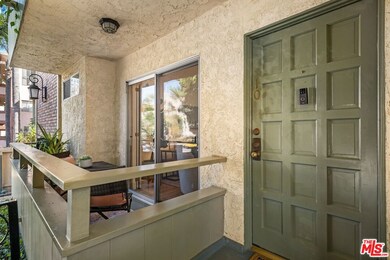 Unit exterior with front-facing balcony
