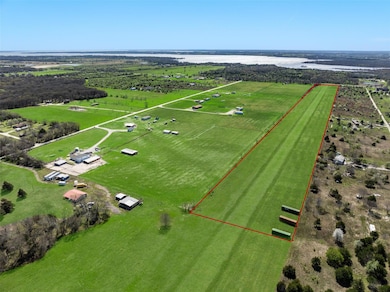 17.6 acres with 2,700' grass airstrip