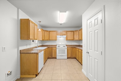 Kitchen has room for your own refrigerator - or on