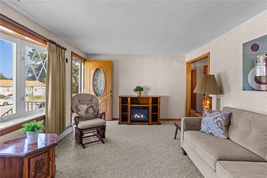 Living room offers plenty of space and sunshine