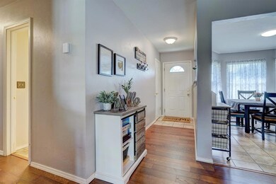 Foyer, breakfast area and hall bath.