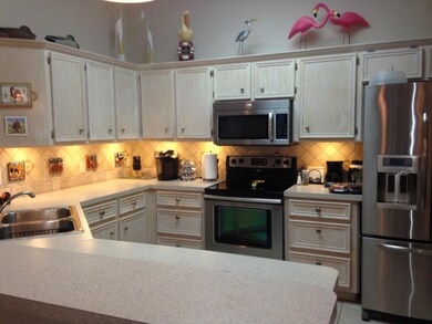 Kitchen with stone tiled backsplash!!
