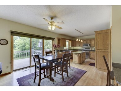 The comfortable, informal dining area enjoys a cen