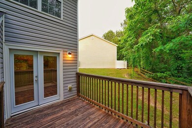 Deck featuring french doors and view with privacy