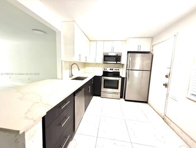1401 NE 191st St unit D201, Miami, FL 33179 - photo 3