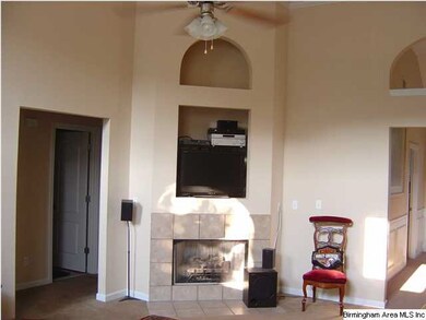 VENT LESS GAS LOG FIREPLACE WITH A TILED SURROUND 