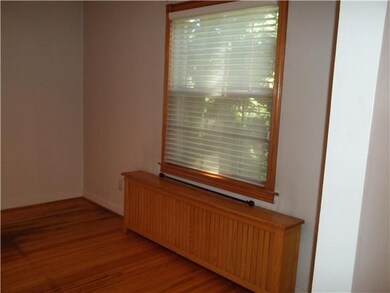 Dining Room. Lovely Amish made cover for radiator.
