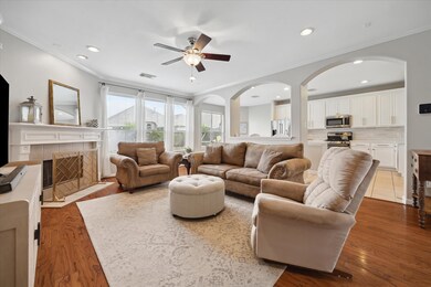 Expansive living room with gaslog fireplace off of