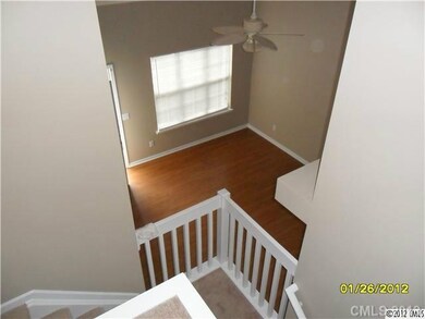 Exterior Front - View down, into Living Room.