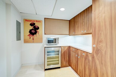 There is additional cabinet space in the butler's