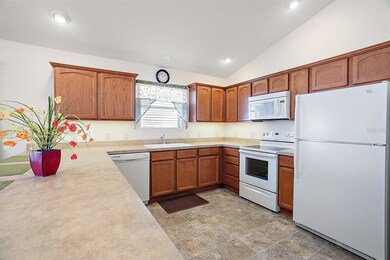 Kitchen with vaulted ceiling