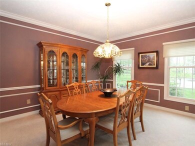 formal dining room with chair rail and moulding