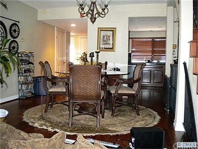 Formal dining on beautiful hardwood floors.