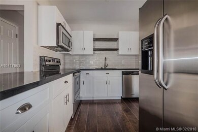 New cabinets, Quartz counter tops, Stainless steel