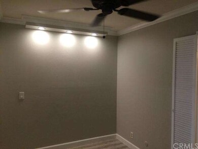 bedroom with new ceiling fan, LED lighting, wood l