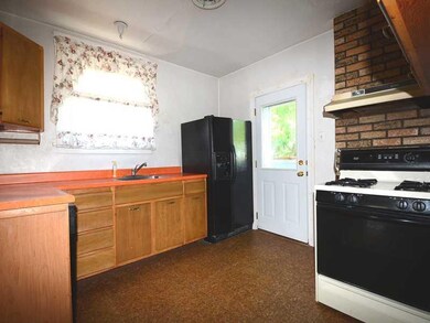 Kitchen. Kitchen with refrigerator, gas stove, dis