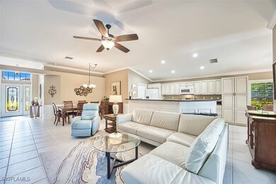 Living area with light tile patterned floors, crow
