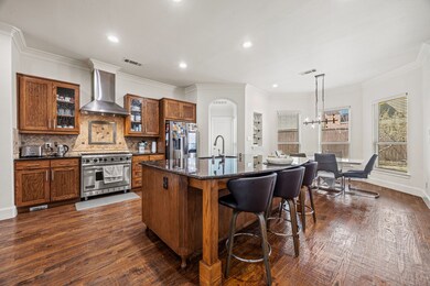 A culinary sanctuary, this chef’s kitchen is wrapp