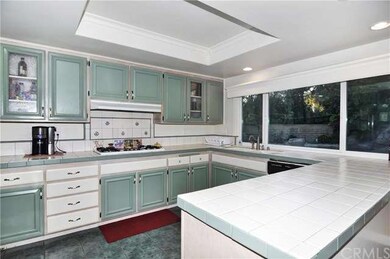 The Kitchen of the home is clean and features an a