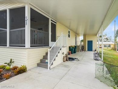 View of patio / terrace with a sunroom