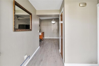 Hall featuring light hardwood / wood-style flooring
