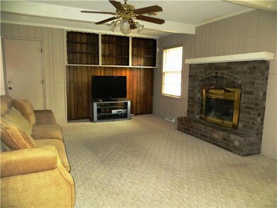 Cozy brick fireplace.