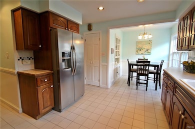 Stainless steel appliances, built-in cabinet, pant