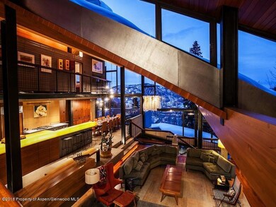 Dramatic View of Living Area and kitchen
