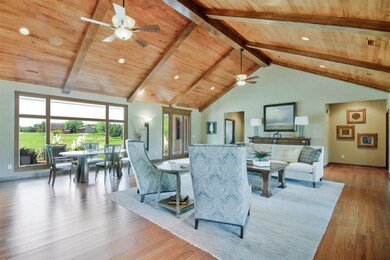 Floor to Ceiling Windows invite the outside in.