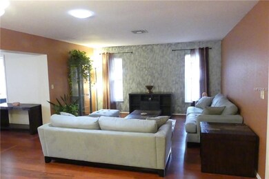 Large living room with plenty of light.