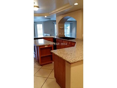 Kitchen. Kitchen looks into sunken Family Room wit