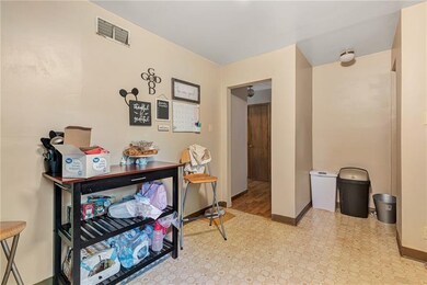 Other side of kitchen where there is room for a br
