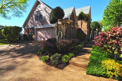 This home features a 2-car garage located to the s
