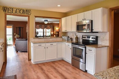 Open feel with a serving window to the great room.