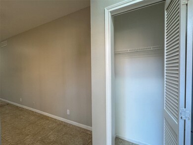 Entrance with coat closet at front