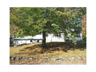Exterior Front. The home shaded by a...