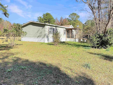 View of front of property featuring a front lawn