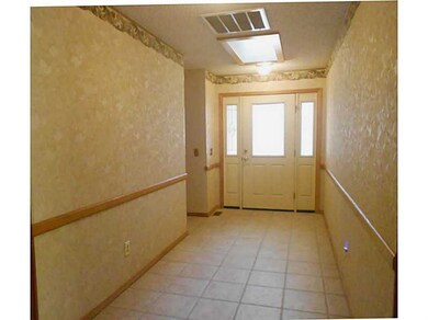 Other. Tiled front entry with skylight, leaded glass doors