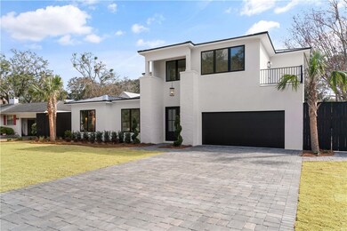 Lush Landscaping with pavers for driveway and walk