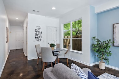 Dining space featuring baseboards, recessed light