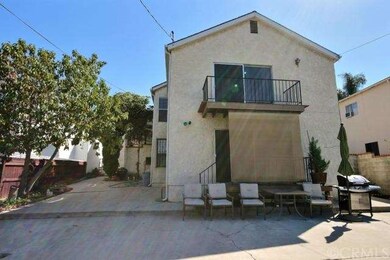 View of house from backyard.  Master bedroom up/de