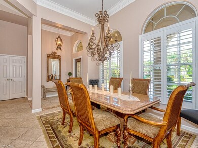 Lovely dining room with elaborate chandelier