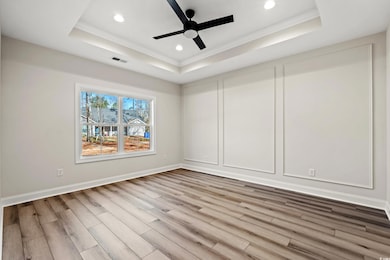 Spare room with hardwood / wood-style floors and a