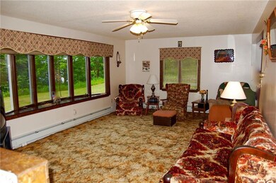 Living room is warm and spacious.