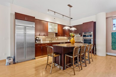 Large island can easily accommodate 5 barstools