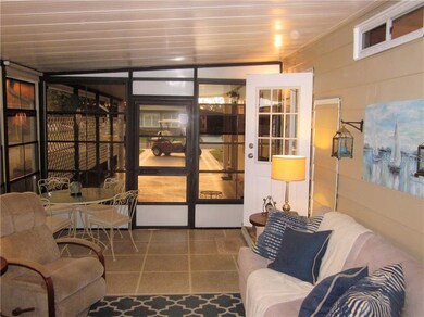 Looking out on carport with lattice work for addit
