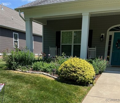 Beautiful gardens, left side of the home.