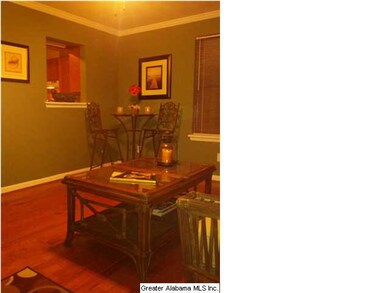 Den/sunroom with serving bar shared with kitchen