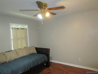 Master bedroom with ceiling fan and one window